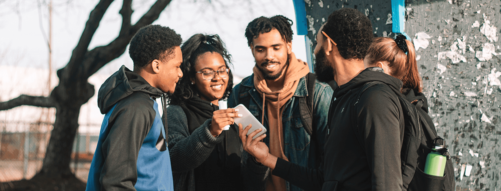 College students gathering together outdoors